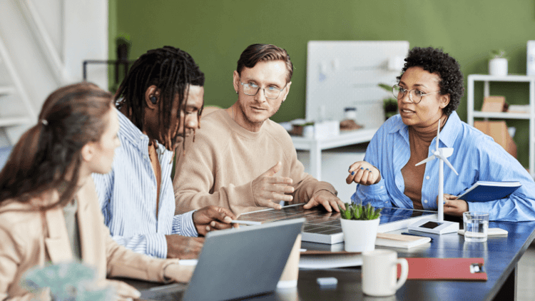 colleagues working in team at office