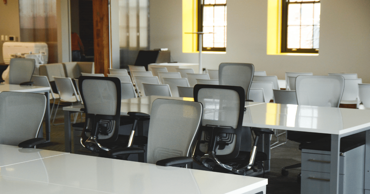 An empty office with shared desks