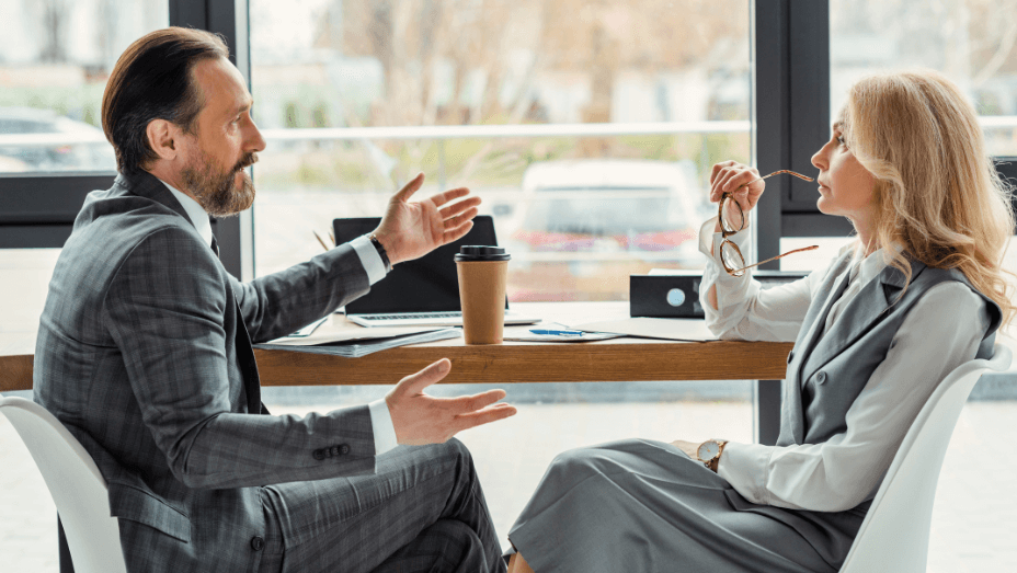 side-view-of-an-employee-talking-to-her-boss